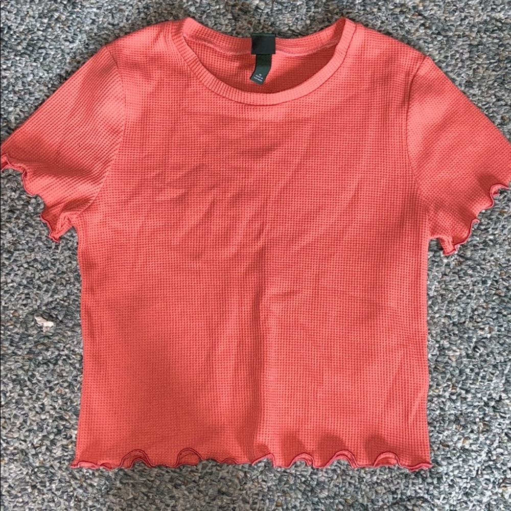 Coral pink colored crop top with ruffles